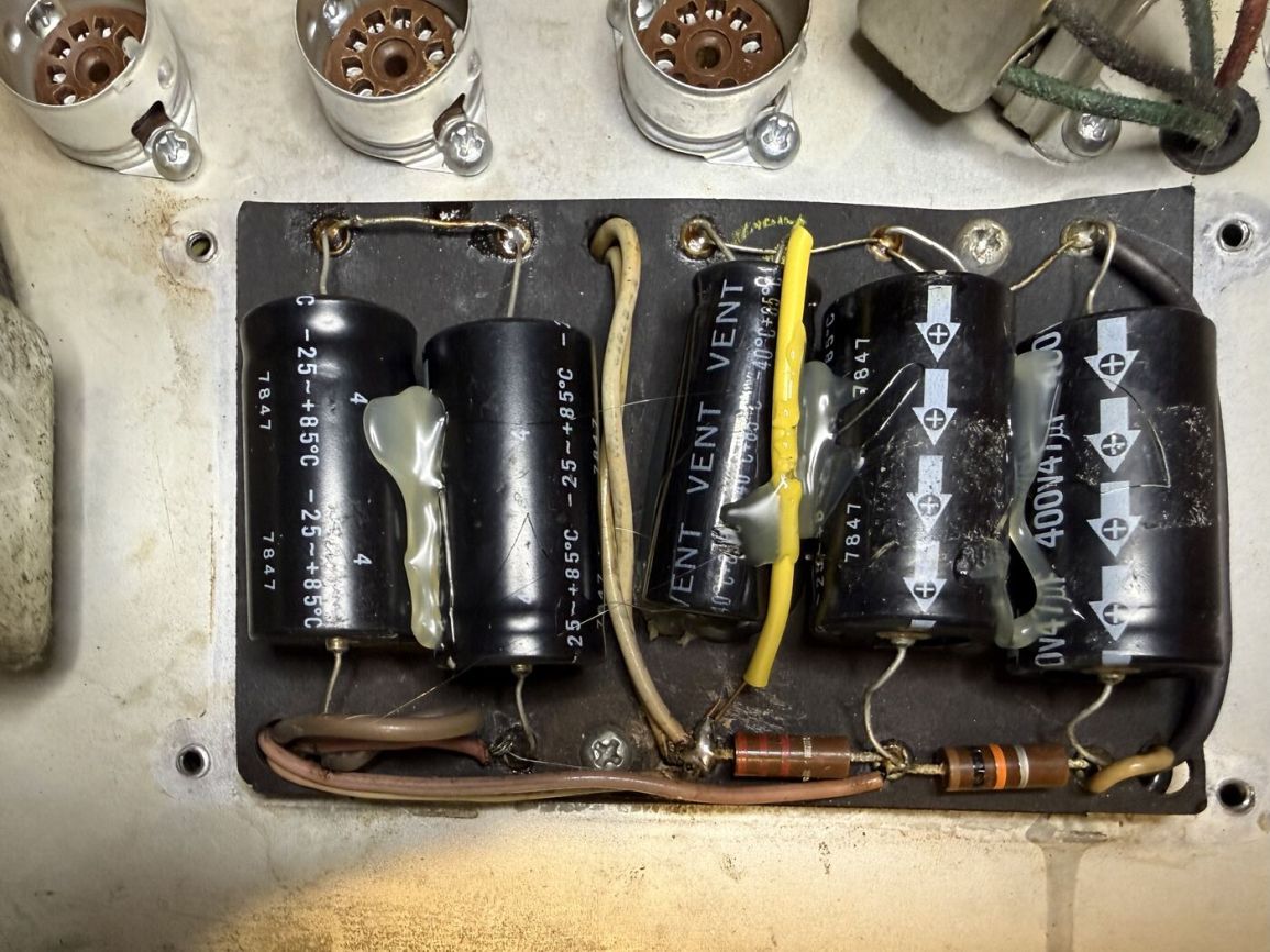 Doghouse filter cap can opened, showing a rushed rewiring job