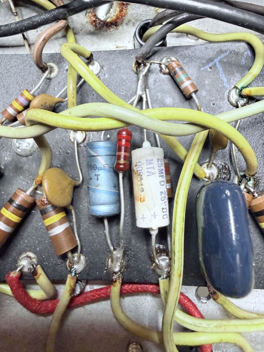 Second close-up of eyelet board components with visible color-band mismatches