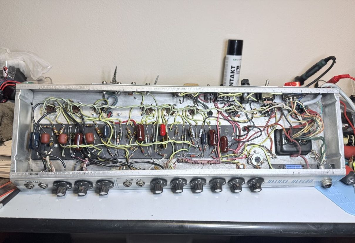 Fully reassembled chassis with all knobs installed, ready for the cabinet