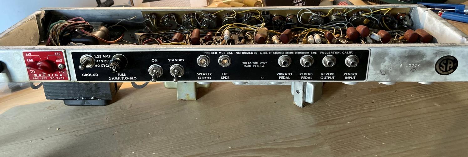 Back panel showing FOR EXPORT ONLY plate, pre-set voltage selector, and serial number