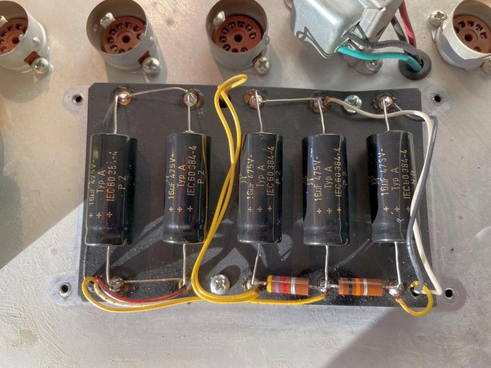 Doghouse board after recap, fresh F&T electrolytic capacitors installed